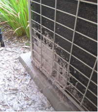 Part 1 of 2 figures- Figure 1 showing noncompliant condensing unit clearance from a dryer vent